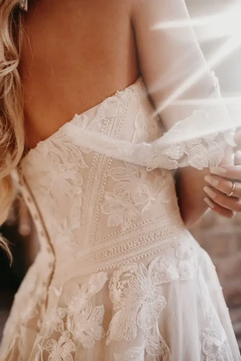 Stella York Julia #1 (IVMC-PL) IVR Lace & Tulle over Moscato Gown w/ Porcelain Tulle Plunge thumbnail